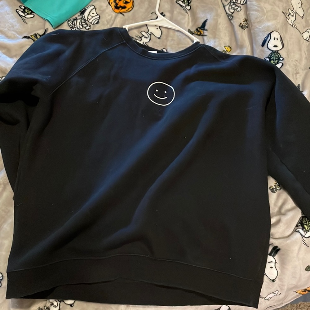 Smiley face sweat shirt